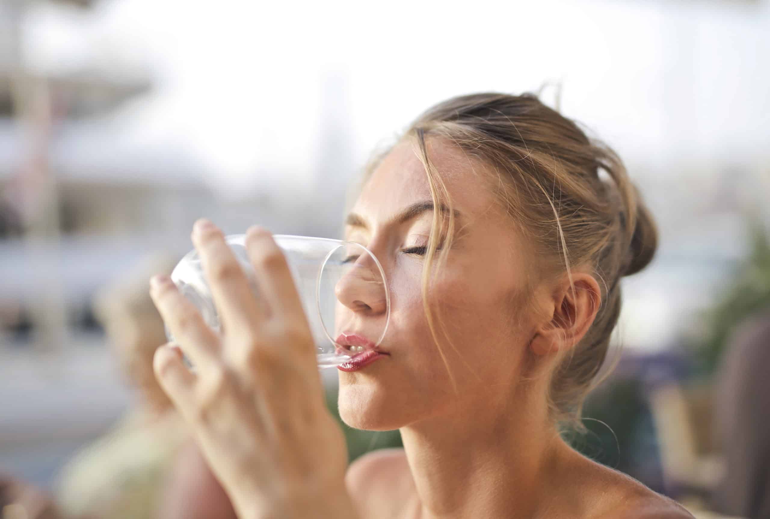 Woman drinking from glass