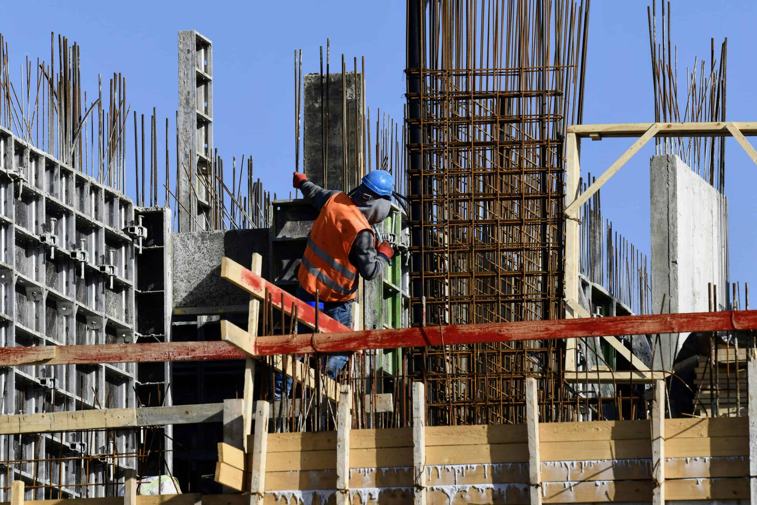 I was walking past a construction site and captured all of these men working together to complete the buildings that will house many people.  observing from the start to the finish a total transformation from an empty lot to a new neighborhood.