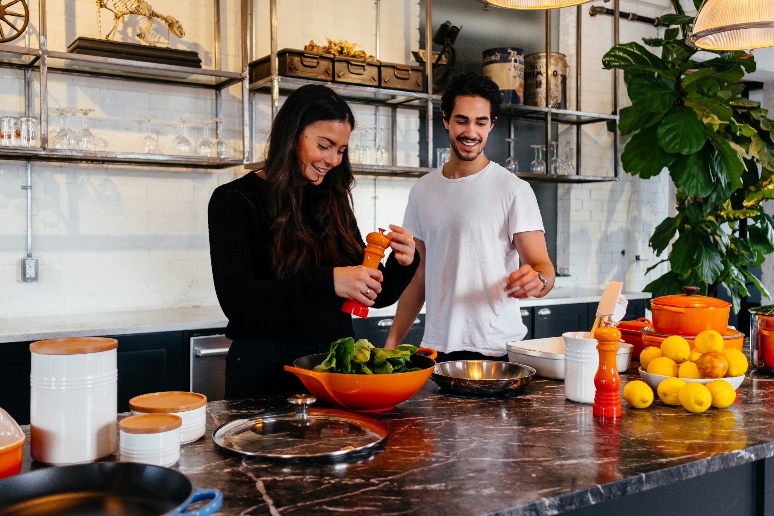 man-and-woman-standing-in-front-of-table-stockpack-unsplash man and woman standing in front of table